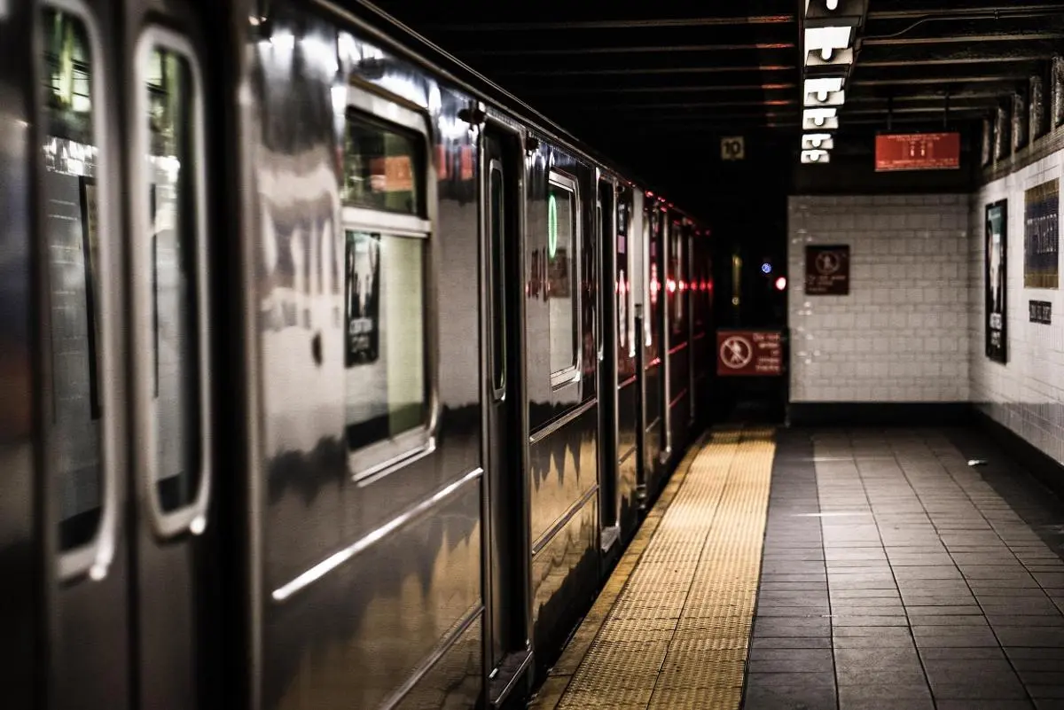 subway train boarding at platform